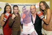17 August 2006; Former World featherweight champion Barry McGuigan with Irish boxer Bernard Dunne, left, and models Gail Kaneswaren, left, and Roberta Rowat at the announcement of details of former five time World champion &quot;Sugar&quot; Ray Leonard's upcoming visit to Ireland in October. The highlight of his trip will be a gala dinner held in his honour at the Burlington Hotel which will be compered by Jimmy Magee. Burlington Hotel, Dublin. Picture credit; Matt Browne / SPORTSFILE