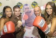 17 August 2006; Former World featherweight champion Barry McGuigan, right, with Irish boxer Bernard Dunne and models Gail Kaneswaren, left, and Roberta Rowat at the announcement of details of former five time World champion "Sugar" Ray Leonard's upcoming visit to Ireland in October. The highlight of his trip will be a gala dinner held in his honour at the Burlington Hotel which will be compered by Jimmy Magee. Burlington Hotel, Dublin. Picture credit; Matt Browne / SPORTSFILE