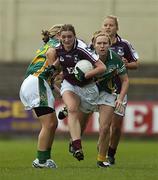 19 August 2006; Annette Clarke, Galway, in action against Michelle Doyle, left, and Suzanne McCormack, Meath. TG4 Ladies All-Ireland Senior Football Championship Quarter-Final, Galway v Meath, O'Moore Park, Portlaoise, Co. Laois. Picture credit: Brendan Moran / SPORTSFILE