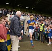 12 July 2014; Séamus Callanan, Tipperary, makes his way to the pitch before the game. GAA Hurling All-Ireland Senior Championship Round 2, Tipperary v Offaly. O'Moore Park, Portlaoise, Co. Laois. Picture credit: Piaras Ó Mídheach / SPORTSFILE