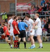 13 July 2014; Emmet Bolton, right, Kildare, and Conor Laverty, Down, in heated discussion before Bolton and Mark Poland, Down, not pictured, were both shown the yellow card by referee David Coldrick. GAA Football All-Ireland Senior Championship Round 2B, Down v Kildare, Páirc Esler, Newry, Co. Down. Picture credit: Piaras Ó Mídheach / SPORTSFILE