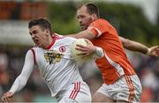 13 July 2014; Ciarán McKeever, Armagh, fouls Patrick McEnice, Tyrone which led to him recieving a black card. GAA Football All-Ireland Senior Championship Round 2B, Tyrone v Armagh, Healy Park, Omagh, Co. Tyrone. Picture credit: Barry Cregg / SPORTSFILE