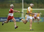 13 July 2014; Conor Carson, Antrim, in action against Oisin McCloskey, Derry. Ulster GAA Hurling Senior Championship Final, Antrim v Derry, Owenbeg, Derry. Picture credit: Oliver McVeigh / SPORTSFILE