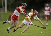 13 July 2014; PJ O'Connell, Antrim, in action against Conor Quinn, Derry. Ulster GAA Hurling Senior Championship Final, Antrim v Derry, Owenbeg, Derry. Picture credit: Oliver McVeigh / SPORTSFILE