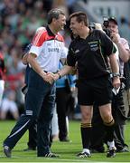 13 July 2014; Cork manager Jimmy Barry-Murphy shakes hands with referee Brian Gavin after the game. Munster GAA Hurling Senior Championship Final, Cork v Limerick, Pairc Uí Chaoimh, Cork. Picture credit: Brendan Moran / SPORTSFILE