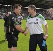13 July 2014; Limerick manager TJ Ryan shakes hands with match referee Brian Gavin before the game. Munster GAA Hurling Senior Championship Final, Cork v Limerick, Pairc Uí Chaoimh, Cork. Picture credit: Ray McManus / SPORTSFILE