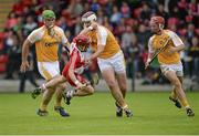 13 July 2014; Aaron Kelly, Derry, in action against Matthew Donnelly, Conor Carson and Daniel McKernan , Antrim. Ulster GAA Hurling Senior Championship Final, Antrim v Derry, Owenbeg, Derry. Picture credit: Oliver McVeigh / SPORTSFILE