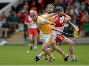 13 July 2014; PJ O'Connell, Antrim, in action against Conor Quinn, Derry. Ulster GAA Hurling Senior Championship Final, Antrim v Derry, Owenbeg, Derry. Picture credit: Oliver McVeigh / SPORTSFILE