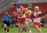 13 July 2014; Darren Hamill, Antrim, in action against Liam Og Hinphey and Sean McGuigan, Derry. Ulster GAA Hurling Senior Championship Final, Antrim v Derry, Owenbeg, Derry. Picture credit: Oliver McVeigh / SPORTSFILE