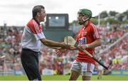 13 July 2014; Cork's Alan Cadogan is greeted by manager Jimmy Barry Murphy after he was substituted late on in the second half. Munster GAA Hurling Senior Championship Final, Cork v Limerick, Pairc Uí Chaoimh, Cork. Picture credit: Diarmuid Greene / SPORTSFILE