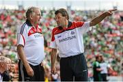 13 July 2014; Cork manager Jimmy Barry Murphy in conversation with Dr. Con Murphy during the second half. Munster GAA Hurling Senior Championship Final, Cork v Limerick, Pairc Uí Chaoimh, Cork. Picture credit: Diarmuid Greene / SPORTSFILE