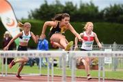 13 July 2014; Ciara Deely, from Kilkenny City Harriers AC, on her way to winning the girls under-15 80m hurdles. GloHealth Juvenile Track and Field Championships, Tullamore Harriers AC, Tullamore, Co. Offaly. Picture credit: Matt Browne / SPORTSFILE