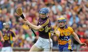 12 July 2014; Rory Jacob, Wexford, in action against Seadna Morey, Clare. GAA Hurling All-Ireland Senior Championship Round 1 Replay, Clare v Wexford, Wexford Park, Wexford. Picture credit: Dáire Brennan / SPORTSFILE