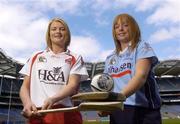 14 August 2006; Dublin captain Ann McCluskey, right, and Derry captain Claire Docherty at a photocall ahead of the All-Ireland Junior camogie Final to be played between Dublin and Derry on Saturday the 19th of August, Croke Park, Dublin. Picture credit: Damien Eagers / SPORTSFILE