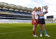 14 August 2006; Dublin captain Ann McCluskey, right, and Derry captain Claire Docherty with the New Ireland Cup at a photocall ahead of the All-Ireland Junior camogie Final to be played between Dublin and Derry on Saturday the 19th of August, Croke Park, Dublin. Picture credit: Damien Eagers / SPORTSFILE