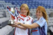 14 August 2006; Dublin captain Ann McCluskey, right, and Derry captain Claire Docherty with the New Ireland Cup at a photocall ahead of the All-Ireland Junior camogie Final to be played between Dublin and Derry on Saturday the 19th of August, Croke Park, Dublin. Picture credit: Damien Eagers / SPORTSFILE