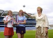 14 August 2006; Liz Howard, President of the Camogie Association, with Dublin captain Ann McCluskey and Derry captain Claire Docherty at a photocall ahead of the All-Ireland Junior camogie Final to be played between Dublin and Derry on Saturday the 19th of August, Croke Park, Dublin. Picture credit: Damien Eagers / SPORTSFILE