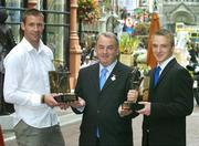 14 August 2006; GAA President Nickey Brennan with Waterford hurler Dan Shanahan and Laois footballer Ross Munnelly who were presented with the Vodafone Player of the Month awards for the month of July. Westbury Hotel, Dublin. Picture credit: Pat Murphy / SPORTSFILE