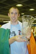 15 August 2006; Current All-Ireland 60x30 champion Eoin Kennedy, St. Brighids GAA club, who won the Men's Doubles with team-mate Tony Healy, member of the Irish handball team, on the team's arrival home from the 2006 World Handball Championships, which took place in Edmonton, Canada. Dublin Airport, Dublin. Picture credit: Brian Lawless / SPORTSFILE