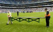 20 August 2006; Stewards remove the team bench as the Laois team warm up before the game. Laois did not sit for an official team photograph before the game. Bank of Ireland All-Ireland Senior Football Championship Quarter-Final Replay, Laois v Mayo, Croke Park, Dublin. Picture credit: Brendan Moran / SPORTSFILE