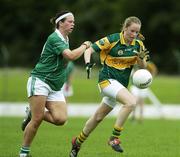 20 August 2006; Teresa Mylott, Leitrim, in action against Mary Ita Casey, Limerick. TG4 Ladies Junior Football Championship Quarter-Final, Leitrim v Limerick, Pairc Ciaran, Athlone, Co. Westmeath. Picture credit: Damien Eagers / SPORTSFILE