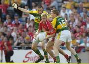 20 August 2006; Anthony Lynch, Cork, in action against Kieran Donaghy and Mike Frank Russell, 15, Kerry. Bank of Ireland All-Ireland Senior Football Championship Semi-Final, Kerry v Cork, Croke Park, Dublin. Picture credit: Brendan Moran / SPORTSFILE