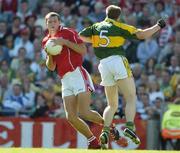 20 August 2006; Pearse O'Neill, Cork, in action against Toma O Se, Kerry. Bank of Ireland All-Ireland Senior Football Championship Semi-Final, Kerry v Cork, Croke Park, Dublin. Picture credit: Brendan Moran / SPORTSFILE