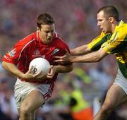 20 August 2006; Kevin O'Sullivan, Cork, in action against Michael McCarthy, Kerry. Bank of Ireland All-Ireland Senior Football Championship Semi-Final, Kerry v Cork, Croke Park, Dublin. Picture credit: Brian Lawless / SPORTSFILE