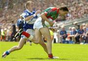 20 August 2006; Alan Dillon, Mayo, is tackled by Joe Higgins, Laois. Bank of Ireland All-Ireland Senior Football Championship Quarter-Final Replay, Laois v Mayo, Croke Park, Dublin. Picture credit: Ray McManus / SPORTSFILE