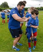 16 July 2014; Marty Moore, Leinster, signs the jersey of Daniel O'Connor, aged 10, from Mullingar, Co. Westmeath during the Herald Leinster Rugby Summer Camps in Mullingar. Mullingar RFC, Co. Westmeath. Picture credit: Dáire Brennan / SPORTSFILE
