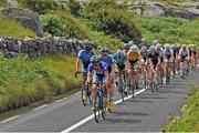 16 July 2014; American Junior Road Race Champion Jonathan Brown, Hot Tubes Cycling, leads the peloton as the race passes through The Burren during Stage 2 of the 2014 International Junior Tour of Ireland, Ennis - Ennis, Co. Clare. Picture credit: Stephen McMahon / SPORTSFILE