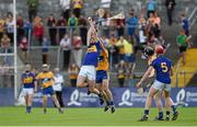 16 July 2014; Colin O'Riordan, Tipperary, in action against Gearoid O'Connell, Clare. Bord Gais Energy Munster GAA Hurling Under 21 Championship Semi-Final, Clare v Tipperary, Cusack Park, Ennis, Co. Clare Picture credit: Diarmuid Greene / SPORTSFILE