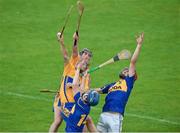 16 July 2014; Jason Forde, left, and Colin O'Riordan, Tipperary, in action against Jack Browne, second from left, and Gearóid O'Connell, Clare. Bord Gais Energy Munster GAA Hurling Under 21 Championship Semi-Final, Clare v Tipperary, Cusack Park, Ennis, Co. Clare. Picture credit: Barry Cregg / SPORTSFILE