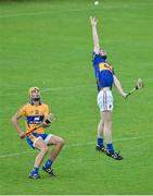 16 July 2014; John Meagher, Tipperary, in action against Peter Duggan, Clare. Bord Gais Energy Munster GAA Hurling Under 21 Championship Semi-Final, Clare v Tipperary, Cusack Park, Ennis, Co. Clare. Picture credit: Barry Cregg / SPORTSFILE