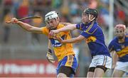 16 July 2014; Conor Cleary, Clare, in action against Bill Maher, Tipperary. Bord Gais Energy Munster GAA Hurling Under 21 Championship Semi-Final, Clare v Tipperary, Cusack Park, Ennis, Co. Clare Picture credit: Diarmuid Greene / SPORTSFILE