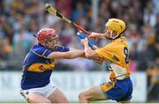 16 July 2014; Colin O'Riordan, Tipperary, in action against Colm Galvin, Clare. Bord Gais Energy Munster GAA Hurling Under 21 Championship Semi-Final, Clare v Tipperary, Cusack Park, Ennis, Co. Clare Picture credit: Diarmuid Greene / SPORTSFILE