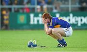16 July 2014; Jason Forde, Tipperary, reacts at the final whistle after defeat to Clare. Bord Gais Energy Munster GAA Hurling Under 21 Championship Semi-Final, Clare v Tipperary, Cusack Park, Ennis, Co. Clare Picture credit: Diarmuid Greene / SPORTSFILE