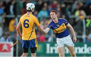 16 July 2014; Conor Cleary, Clare, exchanges a handshake with Jason Forde, Tipperary, after the game. Bord Gais Energy Munster GAA Hurling Under 21 Championship Semi-Final, Clare v Tipperary, Cusack Park, Ennis, Co. Clare Picture credit: Diarmuid Greene / SPORTSFILE