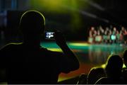 17 July 2014; A spectator records some as 'The Hit Machine Drummers' perform during the opening ceremony of the European Powerchair Football Nations Cup. University of Limerick, Limerick. Picture credit: Diarmuid Greene / SPORTSFILE