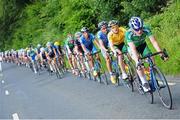 18 July 2014; Daire Feely, Team Ireland, leads the peloton during Stage 4 of the 2014 International Junior Tour of Ireland, Mountshannon - Whitegate, Co. Clare. Picture credit: Stephen McMahon / SPORTSFILE