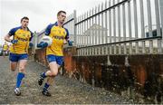 19 July 2014; Roscommon captain Niall Carty leads team-mate Cathal Cregg and his side out onto the field ahead of the game. GAA Football All Ireland Senior Championship, Round 3B, Roscommon v Armagh, Dr. Hyde Park, Roscommon. Picture credit: Barry Cregg / SPORTSFILE