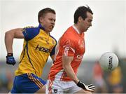 19 July 2014; Tony Kernan, Armagh, in action against Niall Daly, Roscommon. GAA Football All Ireland Senior Championship, Round 3B, Roscommon v Armagh, Dr. Hyde Park, Roscommon. Picture credit: Barry Cregg / SPORTSFILE