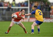 19 July 2014; Tony Kernan, Armagh, in action against Seánie McDermott, Roscommon. GAA Football All Ireland Senior Championship, Round 3B, Roscommon v Armagh, Dr. Hyde Park, Roscommon. Picture credit: Barry Cregg / SPORTSFILE