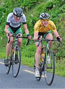 19 July 2014; Race leader Eddie Dunbar, Team Ireland, right, leads teammate Michael O'Loughlin during Stage 5 of the 2014 International Junior Tour of Ireland, Ennis - Gallows Hill, Co. Clare. Picture credit: Stephen McMahon / SPORTSFILE