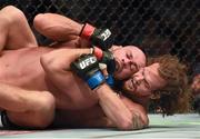 19 July 2014; Cathal Pendred in action against Mike King during their middleweight bout. UFC Fight Night Dublin, The O2, Dublin. Photo by Sportsfile