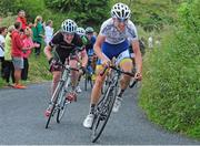 19 July 2014; Craig McCauley, Nicolas Roche Performance Team, leads Dylan O'Brien, Munster Sensa, on the approach to the summit of the Category 1 climb of Gallows Hill at the finish of Stage 5 of the 2014 International Junior Tour of Ireland, Ennis - Gallows Hill, Co. Clare. Picture credit: Stephen McMahon / SPORTSFILE