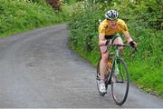 19 July 2014; Race leader Eddie Dunbar, Team Ireland, in action during Stage 5 of the 2014 International Junior Tour of Ireland, Ennis - Gallows Hill, Co. Clare. Picture credit: Stephen McMahon / SPORTSFILE