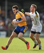 19 July 2014; Shane Brennan, Clare, in action against Alan Smith, Kildare. GAA Football All Ireland Senior Championship, Round 3B, Clare v Kildare, Cusack Park, Ennis, Co. Clare. Picture credit: Diarmuid Greene / SPORTSFILE