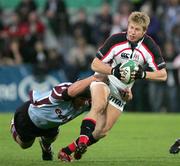 25 August 2006; Paul Steinmetz, Ulster, is tackled by Hendre Fourie, Earth Titans. Grafton Challenge Cup, Ulster v Earth Titans, Ravenhill Park, Belfast, Co. Antrim. Picture credit: Oliver McVeigh / SPORTSFILE