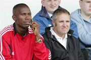26 August 2006; Glenavon manager Colin Malone, right, watching the game with new signing David Atiba Charles who played in this years World Cup with Trinidad and Tobago. CIS Insurance Cup, Portadown v Crusaders, Shamrock Park, Portadown, Co. Armagh. Picture credit: Oliver McVeigh / SPORTSFILE